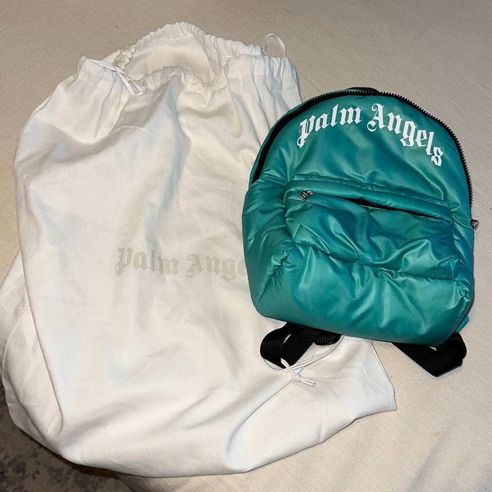 Brand new back pack w/tags and dust bag.